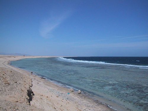 Breaking waves at reef edge south of Safaga. The site is exposed but the beach is protected by the shallow reef resulting in a narrow beach fronted by a shallow shoreface.